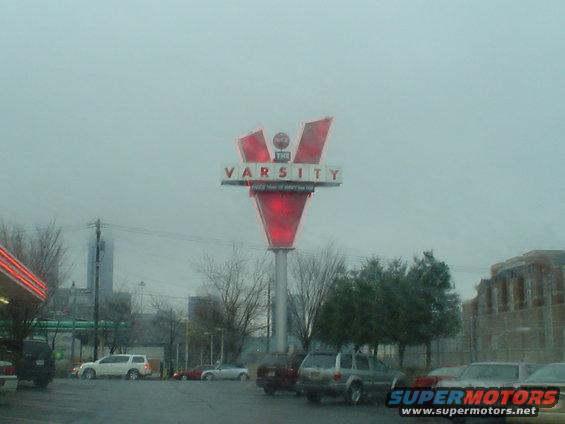 Silver SUV parked in front of The Varsity sign