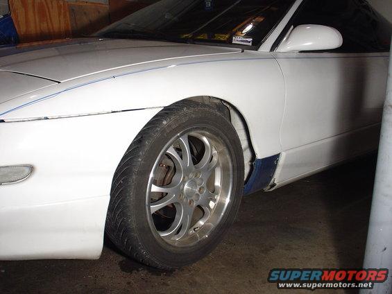 White 1993 Ford Probe 3q-front view showing aftermarket wheels