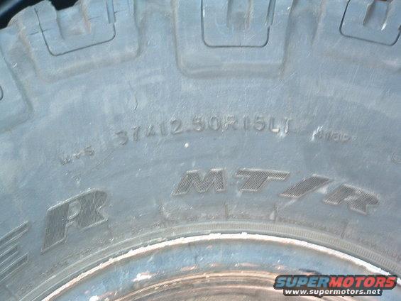 Close-up of a tire with "37x12.50R15LT" and "MTR" visible