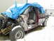 1997 Chevrolet C/K Pickup - This 1997 Chevrolet C/K Pickup is partially covered by a blue tarp in a snowy environment.