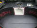 1994 Ford Probe - Custom car trunk setup a subwoofer and speaker enclosure with Mazda 626 badging.