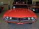 1970 Ford Ranchero - Front view of a red 1970 Ford Ranchero, a distinctive grille and quad headlights.