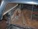 1990 Ford C-350 (Centurion Conversions) - rear wheel well rotted away where Centurion fabricated for spare tire