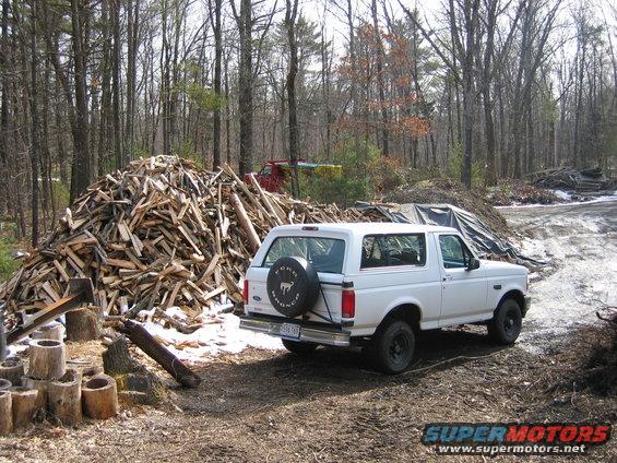 next to wood pile
95 F-350 (sand truck) in the background