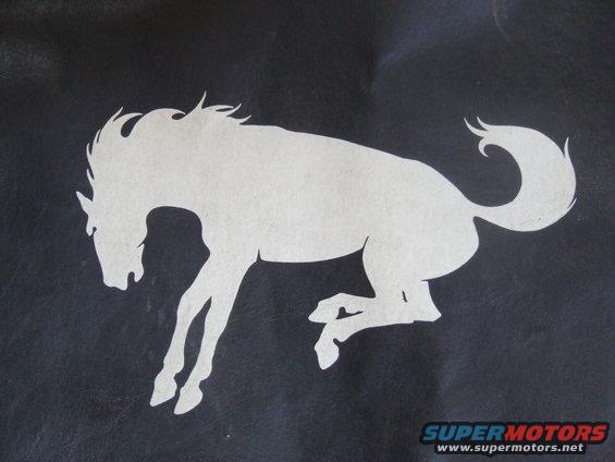 White bronco horse logo on black background