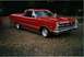 1967 Ford Ranchero - This red 1967 Ford Ranchero pickup truck is shown from a three-quarter front angle.