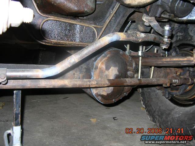 truck-031.jpg this is only a temporary drag link..we shortened it a little too much and it doesn't drop down low enough to clear the spring when there is a lot of flex..the new one should be in soon tho