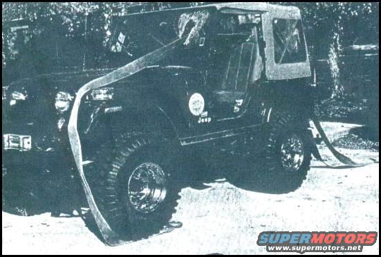 Black Jeep CJ-7 with soft top and large tires, decorated with a ribbon