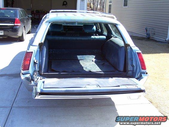 Blue 1970 Oldsmobile Cutlass wagon rear cargo area open