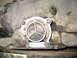 1984 Ford Bronco - Close-up of a transmission component a metal identification tag with part numbers.