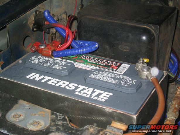 Original battery with about 10 wires coming out of it.