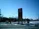 1997 Ford Escort - A dark sedan is visible near a gas station with a 'Soft Touch Auto Wash' sign.