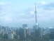 1997 Ford Escort - View of the Toronto skyline the CN Tower, with a Supermotors.net logo in the lower right corner.