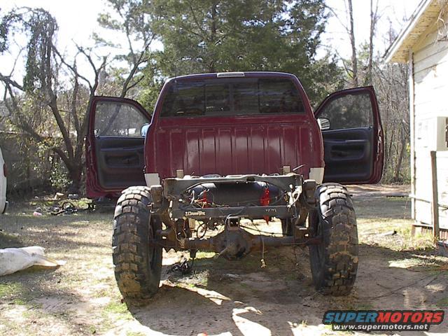 2001 Dodge 1500 pickup truck chassis, rear view, with doors open and bed removed
