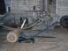 2001 Dodge 1500 - The rear suspension and frame of a truck are shown, supported by a jack and air bag helpers.