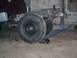 2001 Dodge 1500 - The rear chassis of a truck is visible, with large tires and exposed undercarriage components.