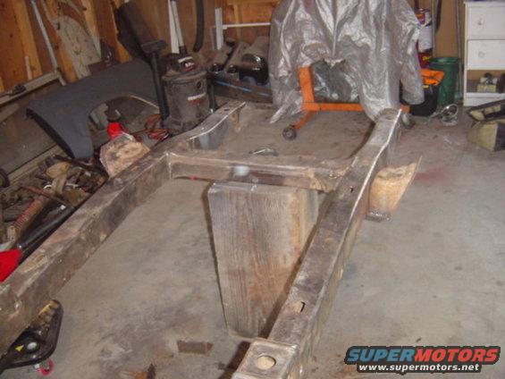 Rear coils buckets on frame.
