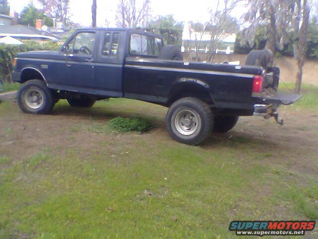 Side view of a 1987 Ford F-250 crew cab pickup truck