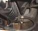 1993 Ford Bronco - Close-up view of a vehicle's radiator, showing inlet and outlet hoses and a line to the transmission cooler.