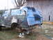 1988 Ford Bronco - This Ford Bronco, possibly from the late 1980s, is undergoing maintenance with its rear axle removed.