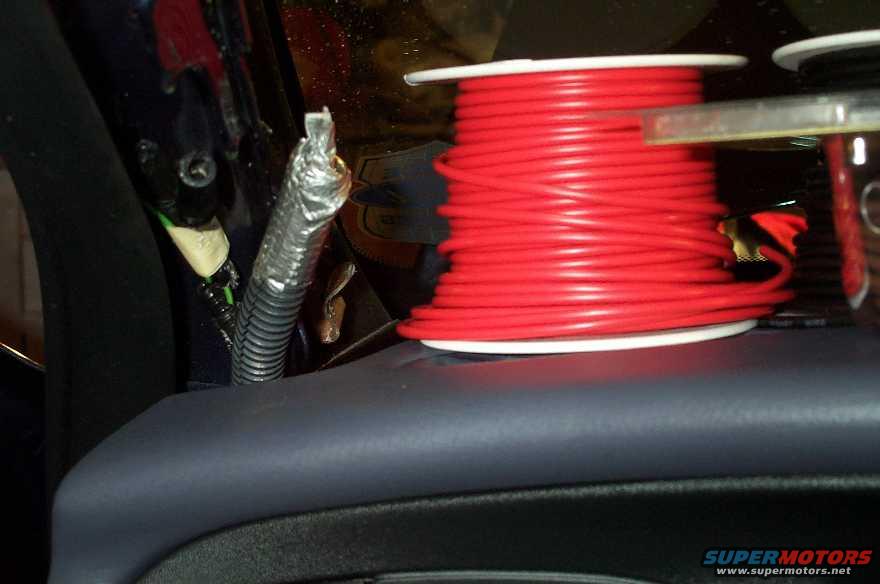 wireloom-dash.jpg All wiring was run through this wireloom for a cleaner install and to keep the wiring together. 