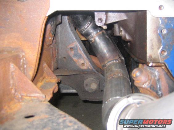 Rusty chassis components and a welded exhaust pipe