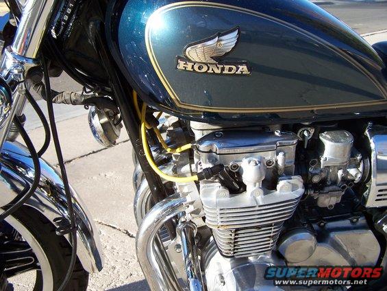 1981 Honda CB750 engine detail with Honda wing logo on teal tank