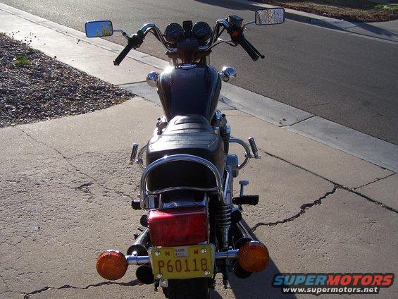 Back view of a motorcycle with a yellow license plate