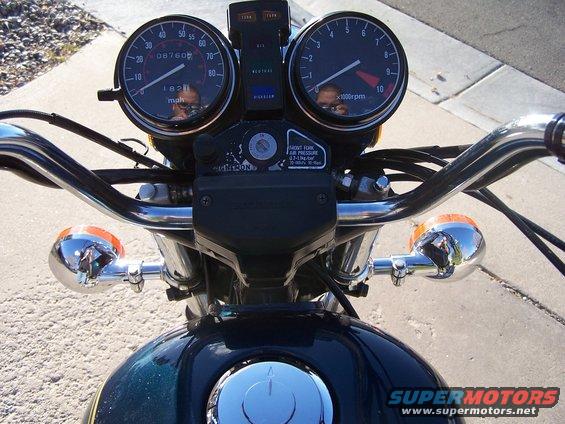 Motorcycle handlebars with dual gauges and turn signals