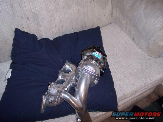 Turbocharger and exhaust manifold with blue label