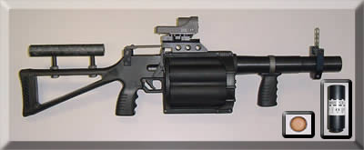 Black grenade launcher with a drum magazine, red dot sight, and adjustable stock