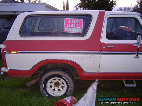 1978 Ford Bronco, two-tone red and white, side view, "FOR SALE" sign in window