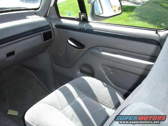 Gray interior with cloth seat and door panel detail