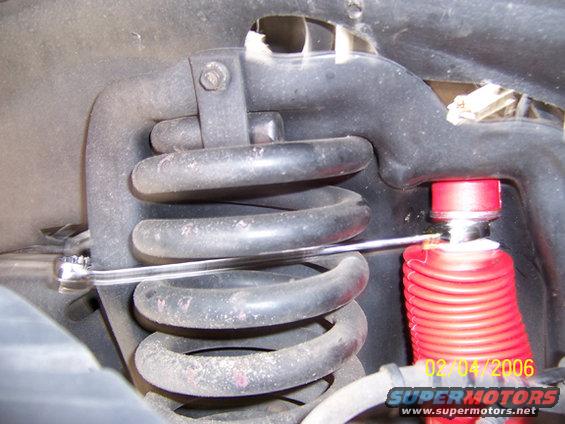 000_0062z.jpg Let the Open Box/End Wrench slide into the coil spring so it will have something to hold on too.