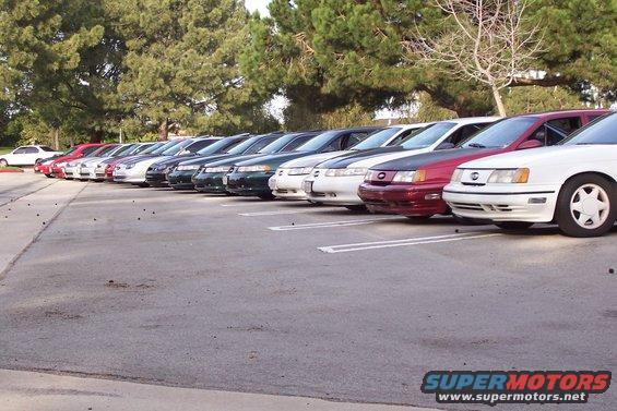 White 1998 Mercury Sable parked in a row of cars