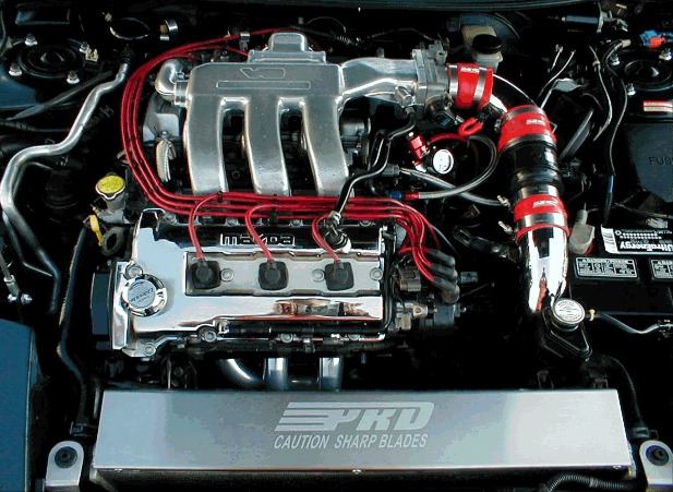 V6 engine with red accents and chrome intake manifold