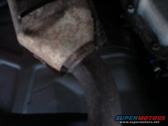 Rusted catalytic converter and exhaust pipe underside