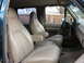 1989 Ford C-350 (Centurion Conversions) - The interior of a truck, showing the front seats, dashboard, and steering wheel.