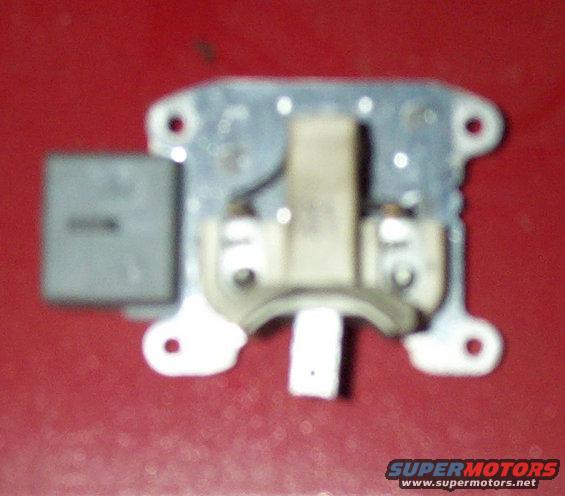 brushes.jpg This is the brush assembly bolted in place on the back of the voltage regulator