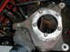 1979 Ford Bronco - A gloved hand holds a rusty metal part, likely from a vehicle's suspension system. The Supermotors.net logo is visible in the lower right c…