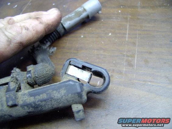 img_0005.jpg Here's the upper socket that pushes onto the ball stud. The shiny spring is supposed to keep pressure on the ball and keep it from jumping out/off the stud.