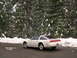 1989 Nissan 300ZX - White 1989 Nissan 300ZX parked near a snow-covered forest road.