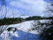 1989 Nissan 300ZX - A winter scene unfolds with a snow-covered field and silhouetted trees against a dynamic sky.