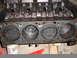 1979 Ford F-150 - Engine block with pistons visible in cylinders. A FRAM oil filter is partially visible.