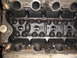 1979 Ford F-150 - This image shows the internal components of an engine block, including valve train parts and visible casting marks.
