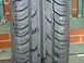 2001 Ford Fiesta - A close-up view of a tire's tread pattern, showing the grooves and blocks.