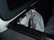 2003 Ford F-150 - Close-up of tonneau cover mounting hardware attached to the truck bed rail, with text indicating 'Front, Driver'.