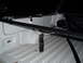 2003 Ford F-150 - The image shows the interior of a truck bed, focusing on the hardware for a tonneau cover. A watermark is visible at the bottom right.