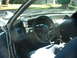 1987 Ford Mustang - Interior view of a 1987 Ford Mustang, highlighting the dashboard and steering wheel.