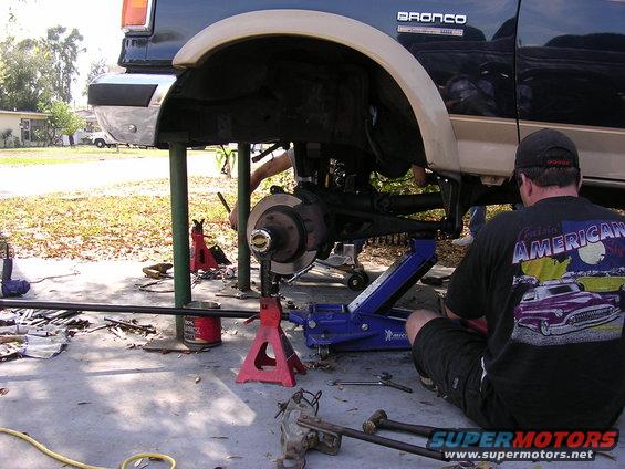1988 Ford Bronco side view, lifted for maintenance